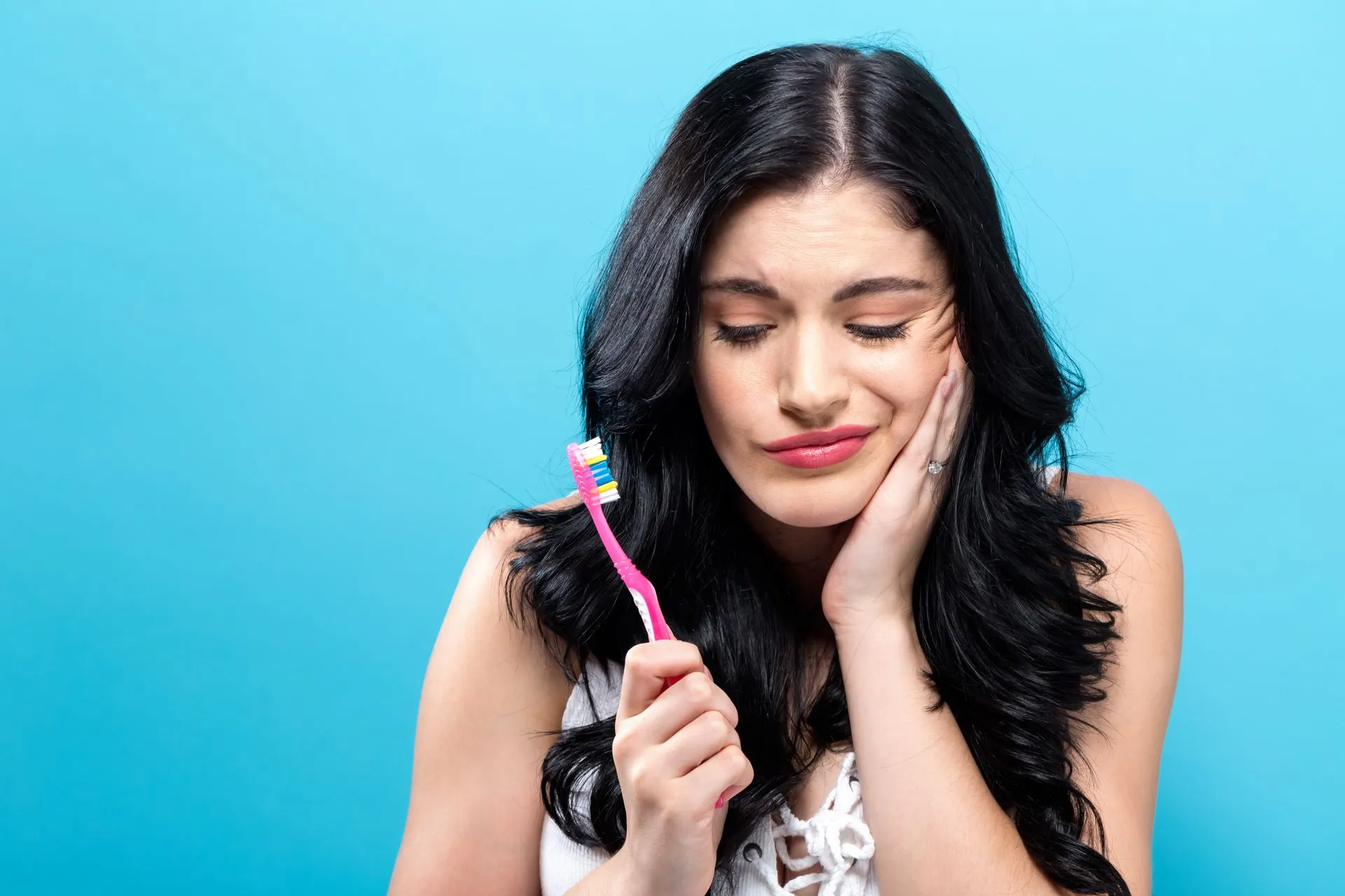 tooth pain when brushing