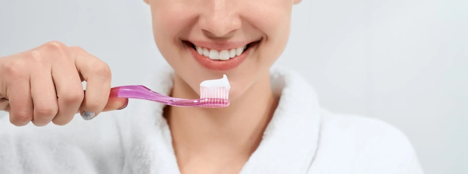 a woman ready to brush her teeth